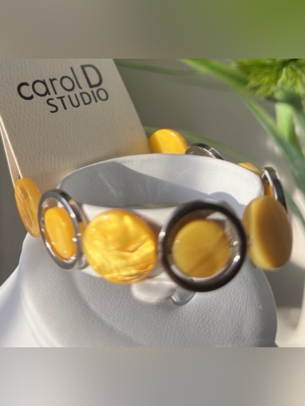 Carol D Studio Yellow round acrylics swivel in silver tone circle,stretch